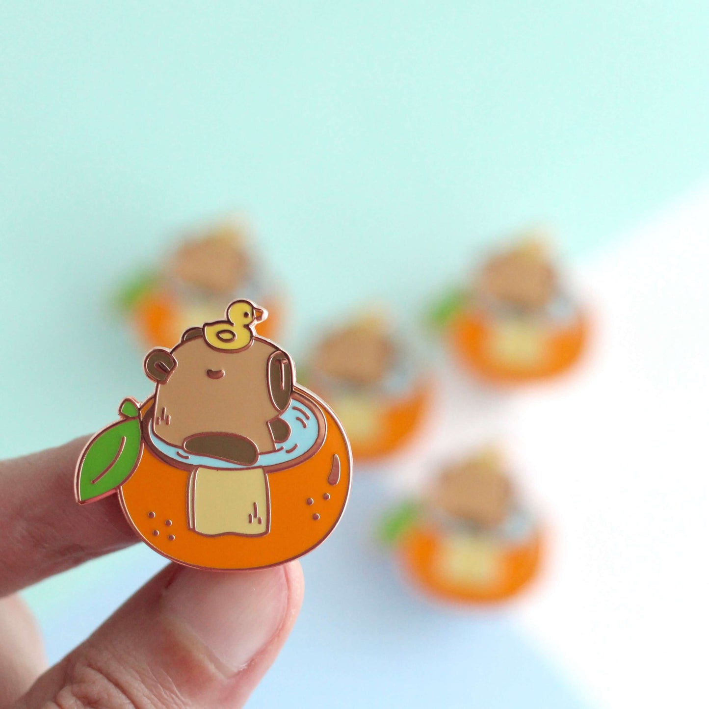 Capybara in Orange Bathtub Enamel Pin