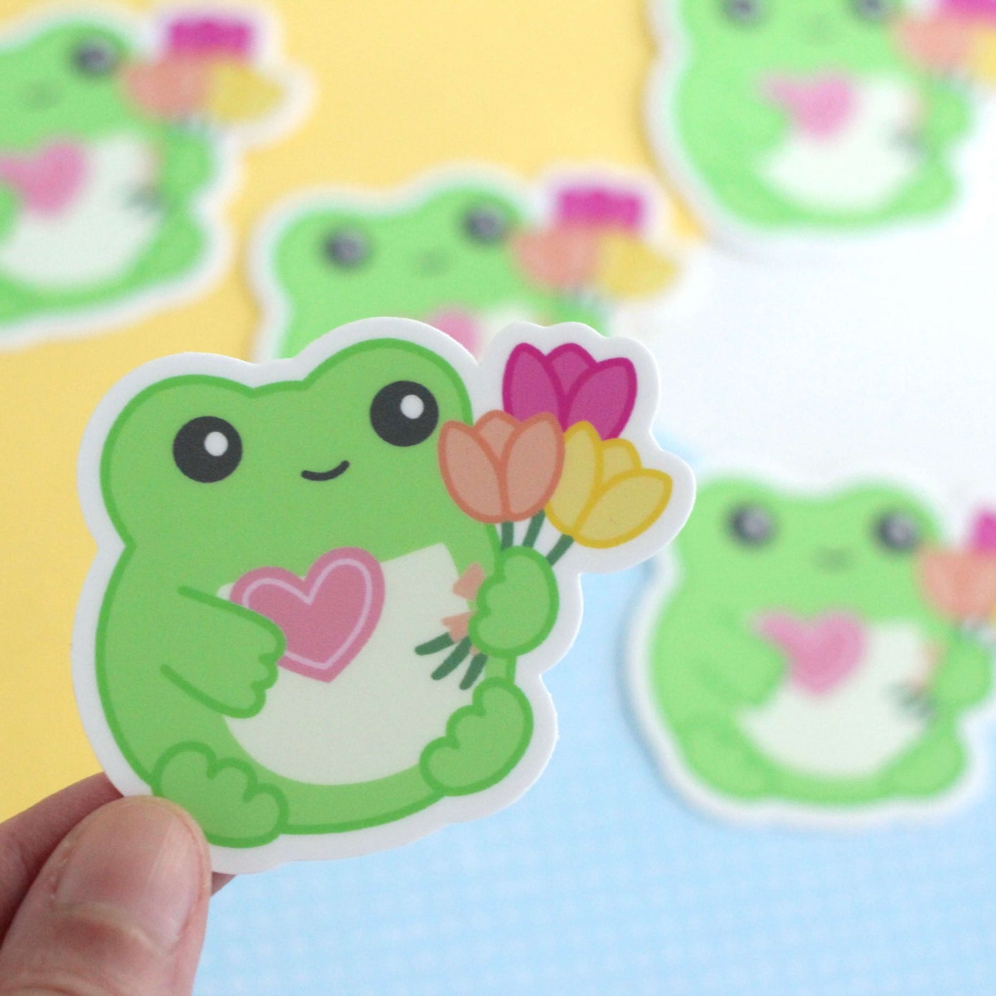 Frog holding Flowers and a Heart Vinyl Sticker