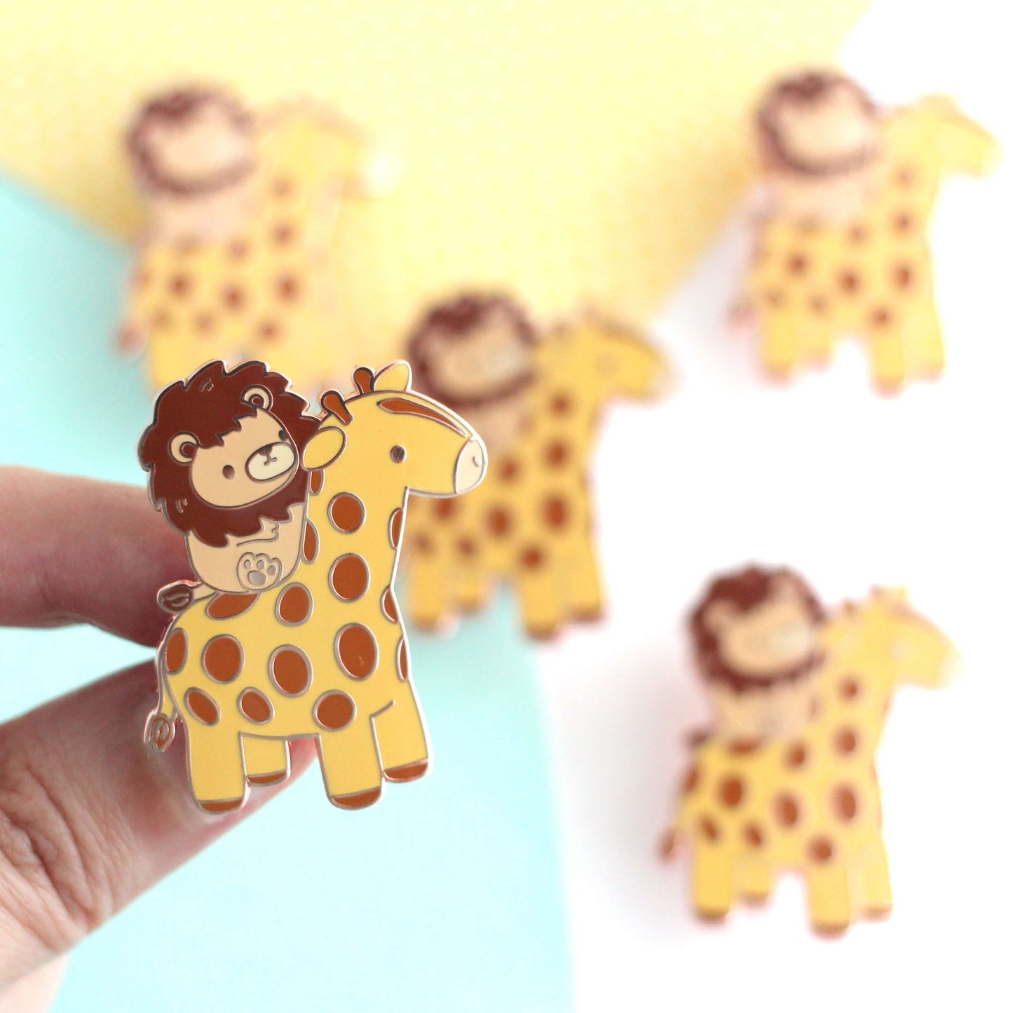 Lion Riding a Giraffe Enamel Pin