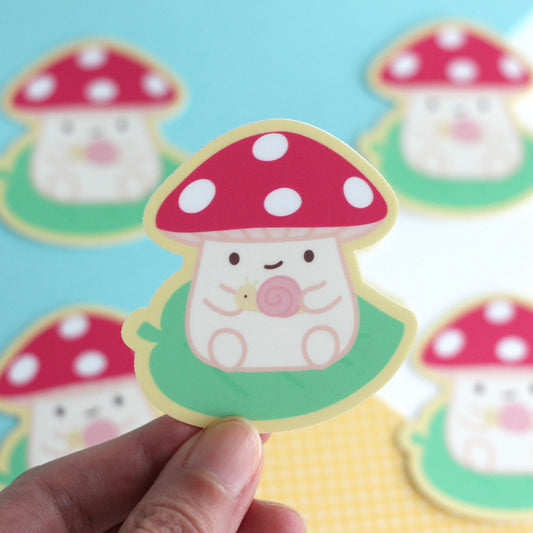 Toadstool Mushroom on a Leaf Holding a Snail Vinyl Sticker