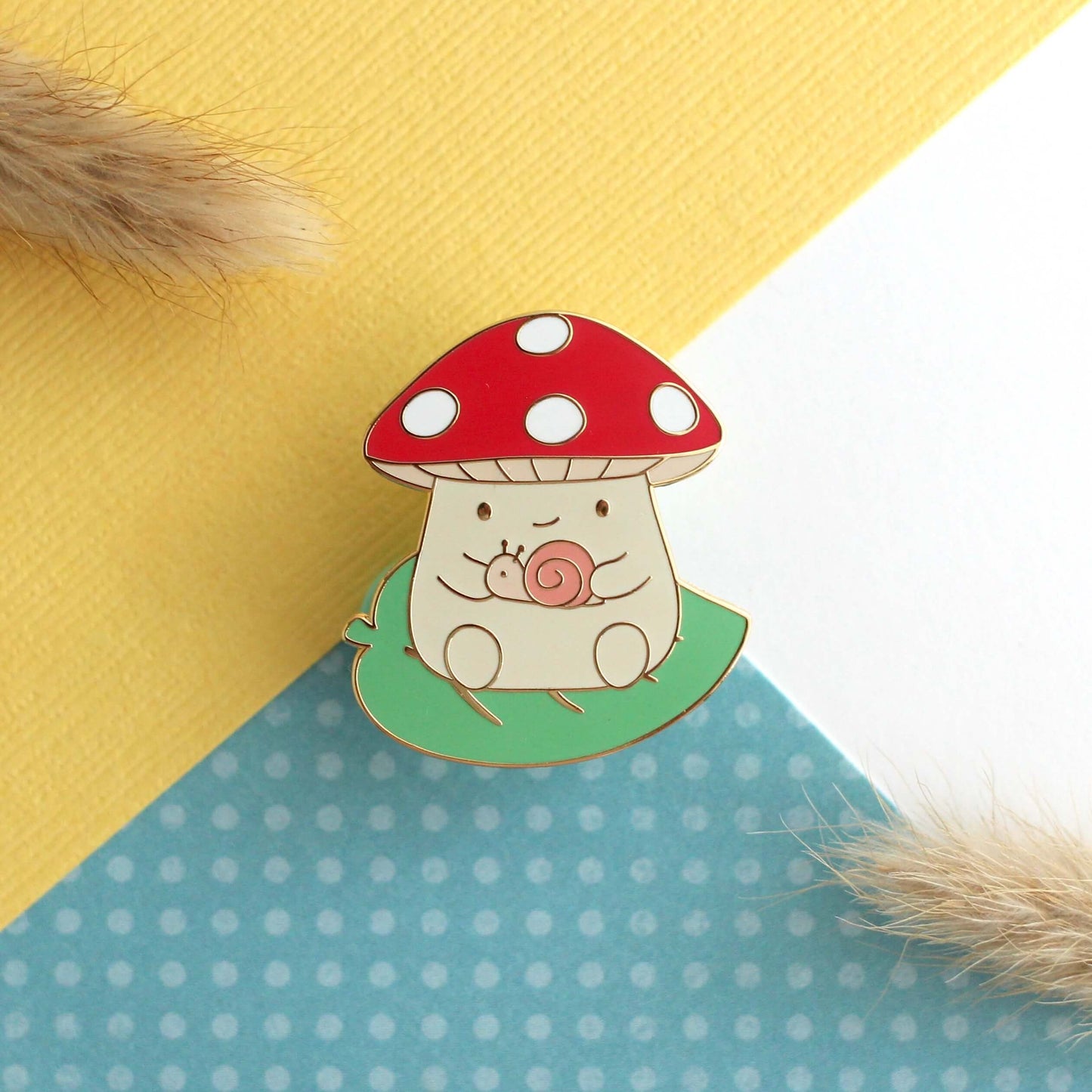 Mushroom on Leaf and holding a Snail Enamel Pin