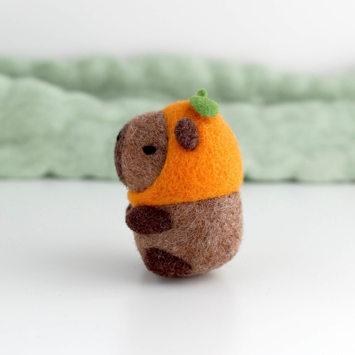 Needle Felted Capybara in Orange Hat