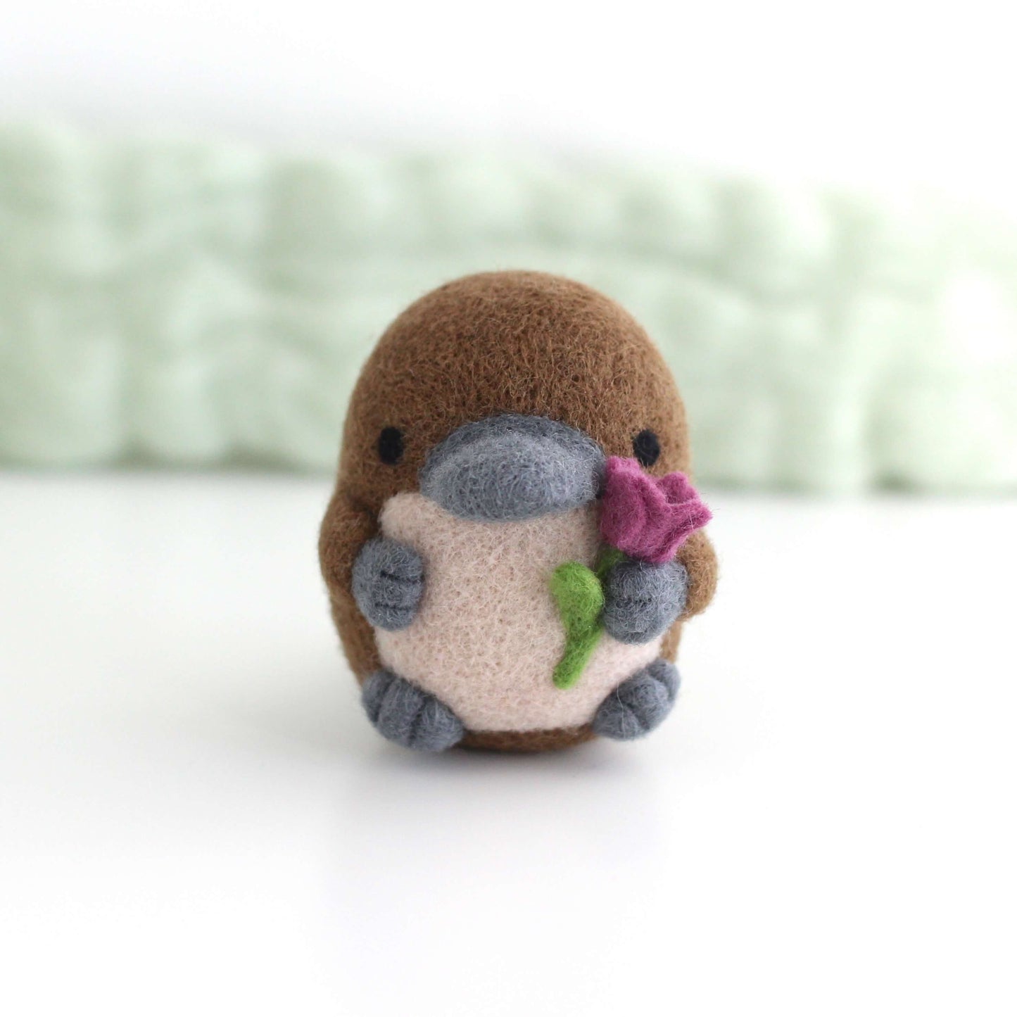 Needle Felted Platypus holding a Tulip (Fuchsia)