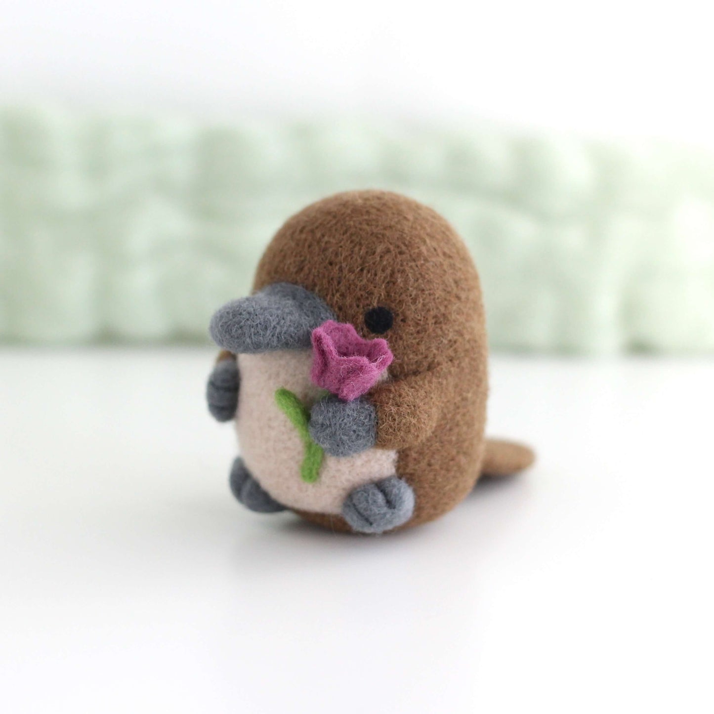 Needle Felted Platypus holding a Tulip (Fuchsia)