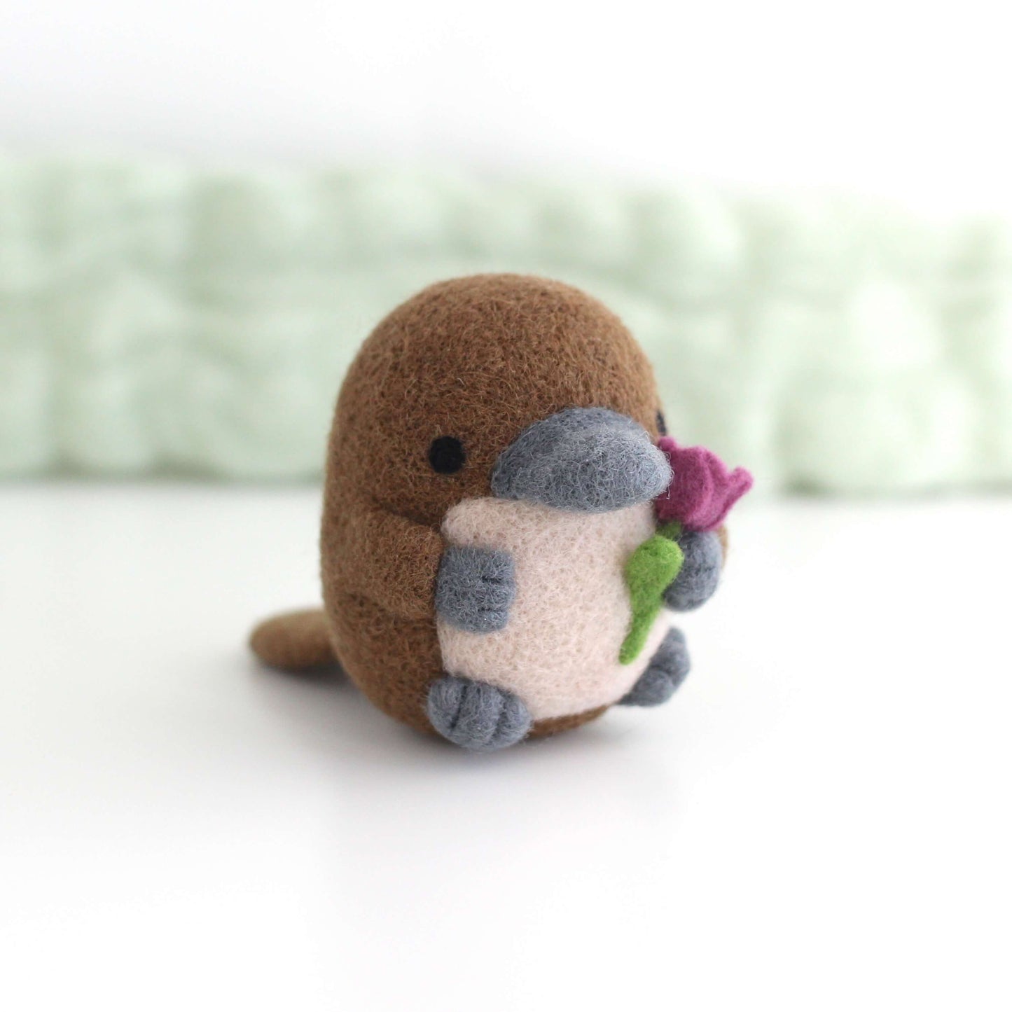 Needle Felted Platypus holding a Tulip (Fuchsia)