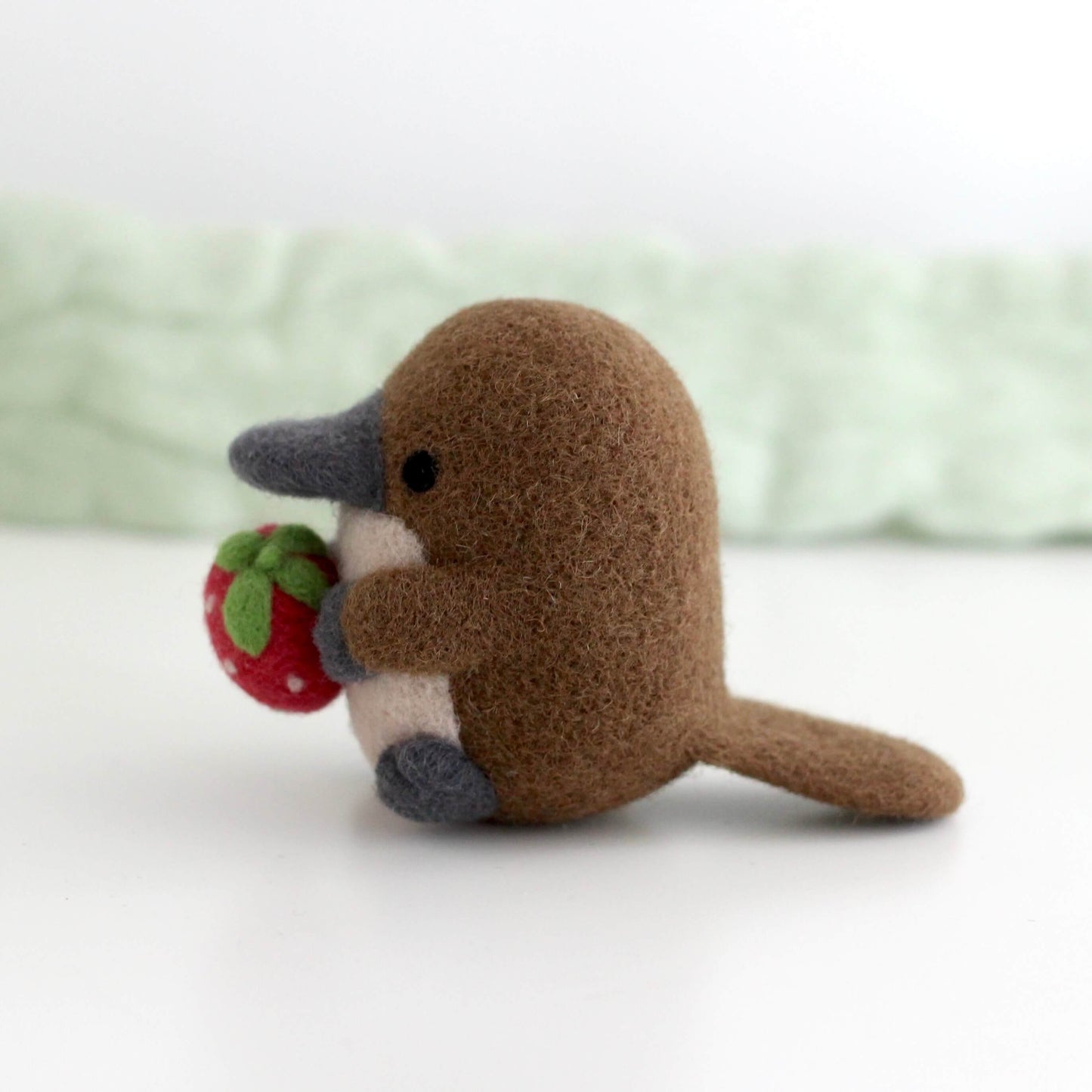 Needle Felted Platypus Holding Strawberry