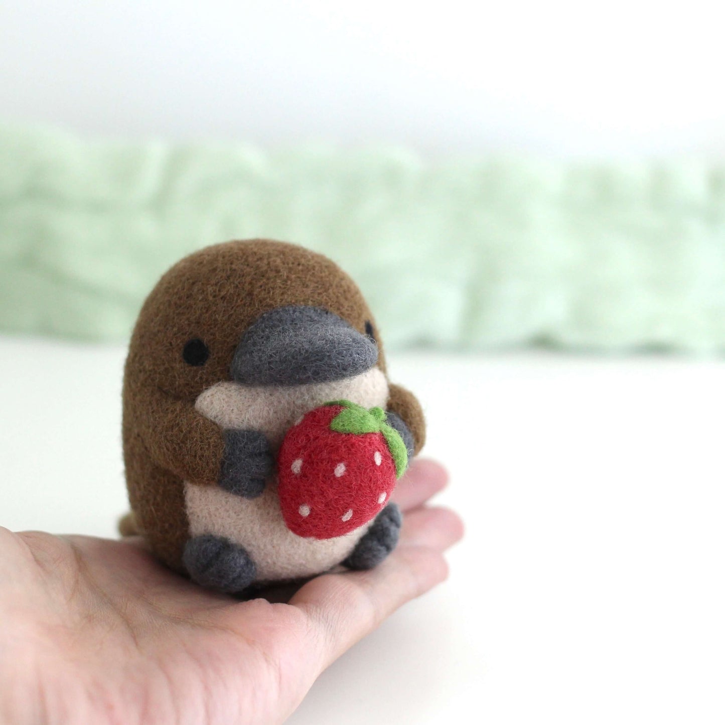 Needle Felted Platypus Holding Strawberry