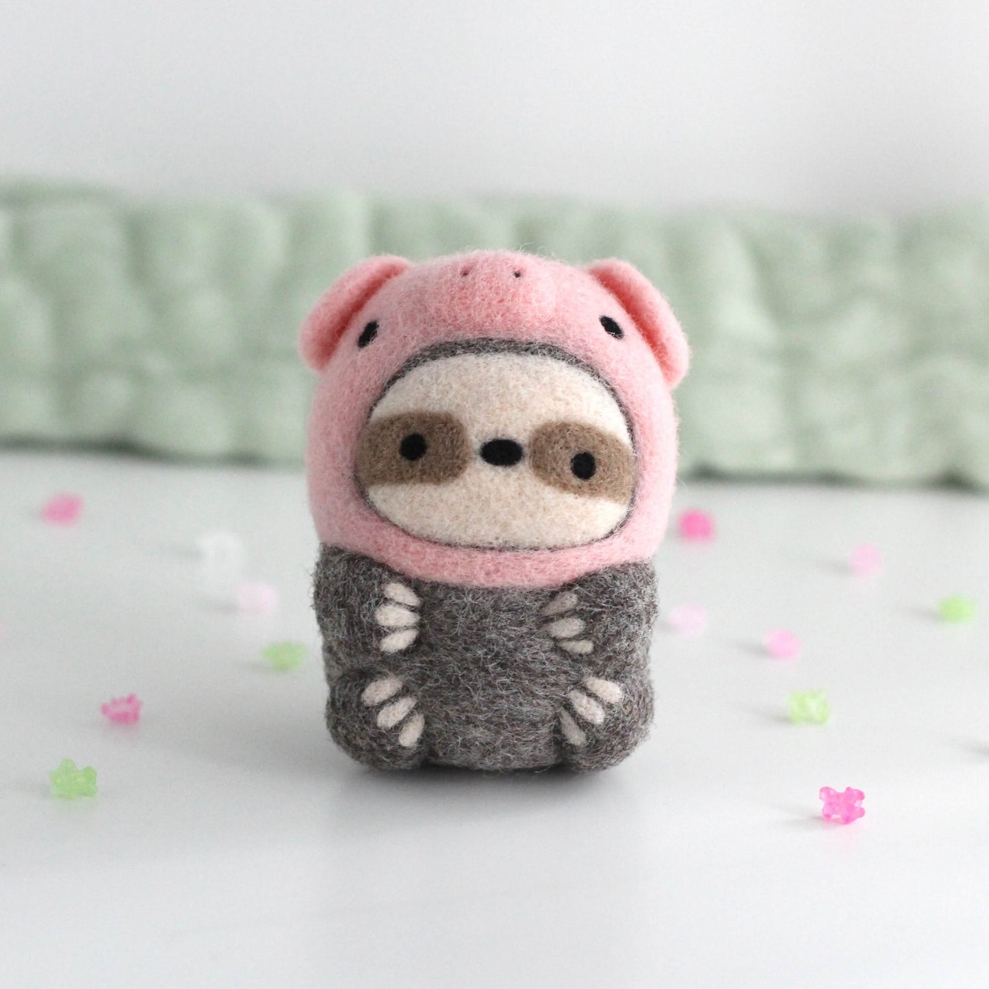 Needle Felted Sloth in Piggy Costume