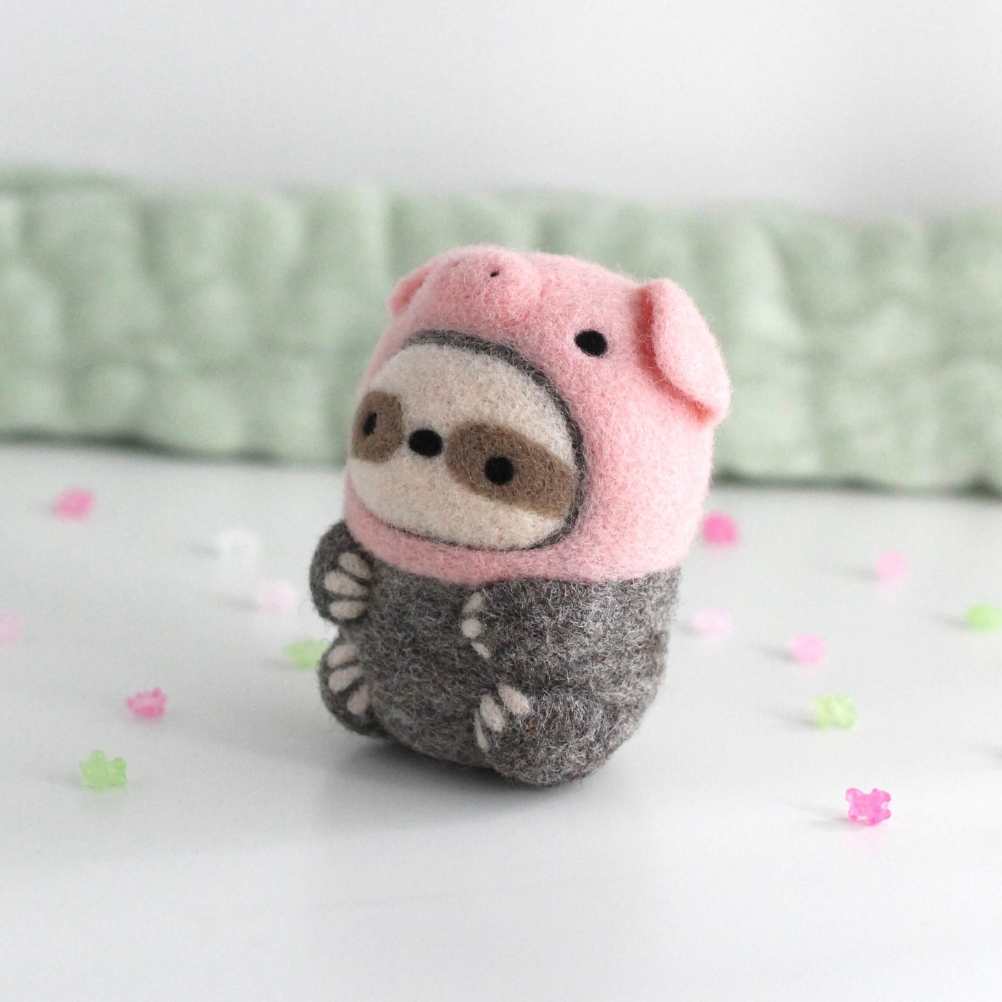 Needle Felted Sloth in Piggy Costume