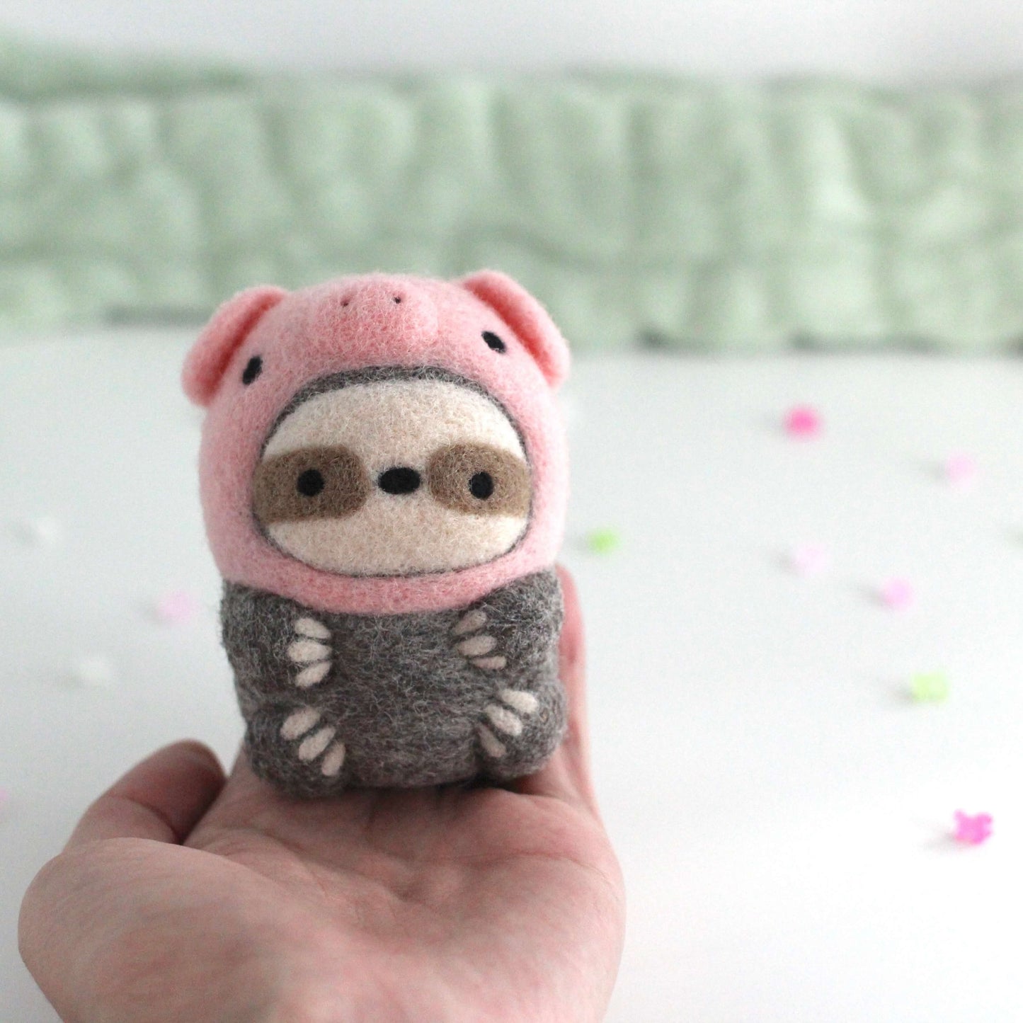 Needle Felted Sloth in Piggy Costume