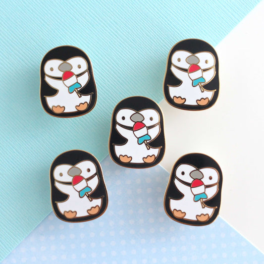 Chinstrap Penguin Holding Rocket Fish Ice Pop Enamel Pin