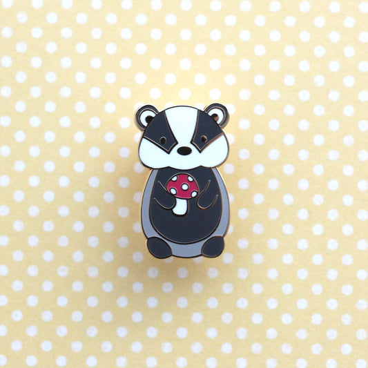 Badger holding Red Mushroom Enamel Pin. Woodland Animal Badge