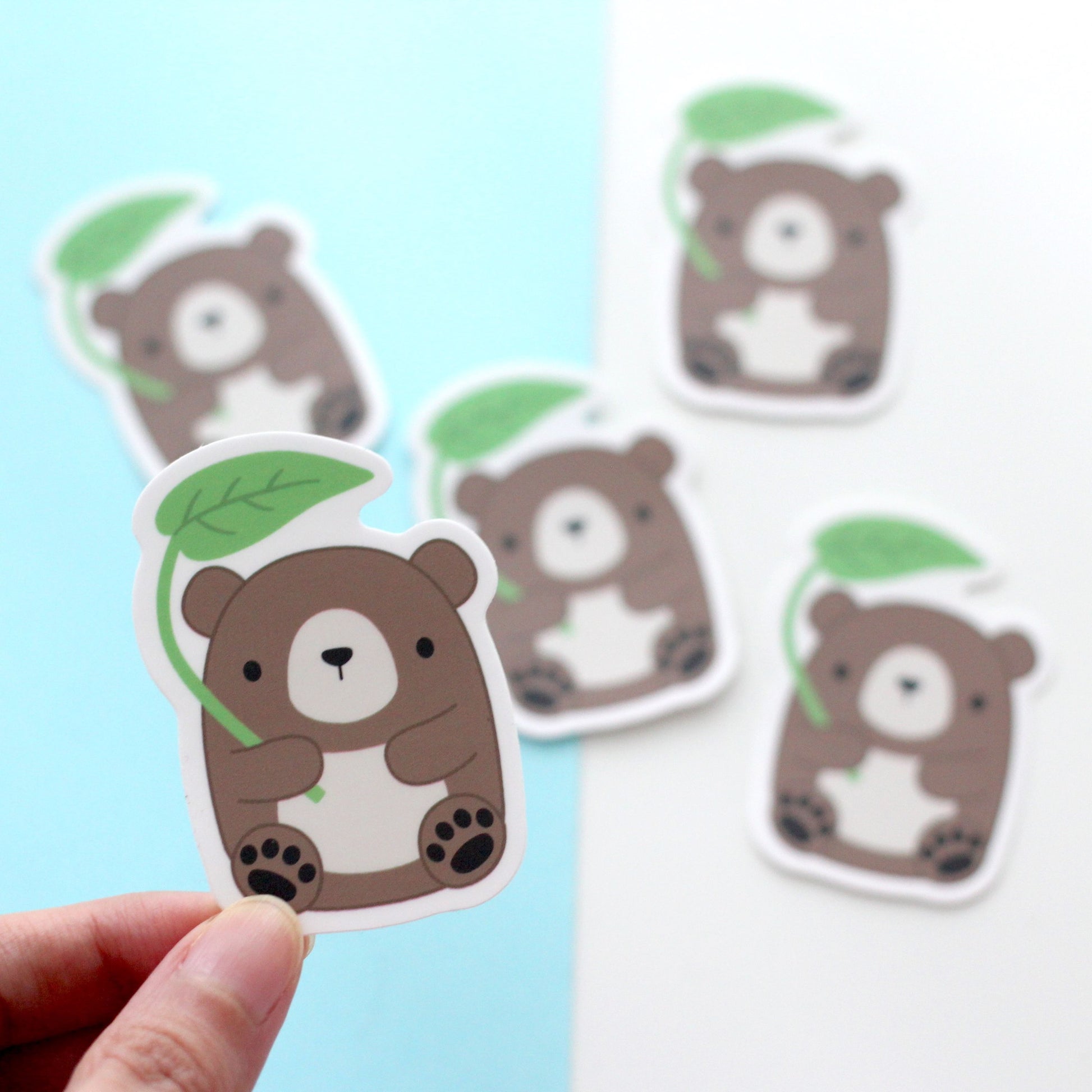 Brown Bear with Leaf Umbrella Vinyl Sticker. Laptop and Phone Decal