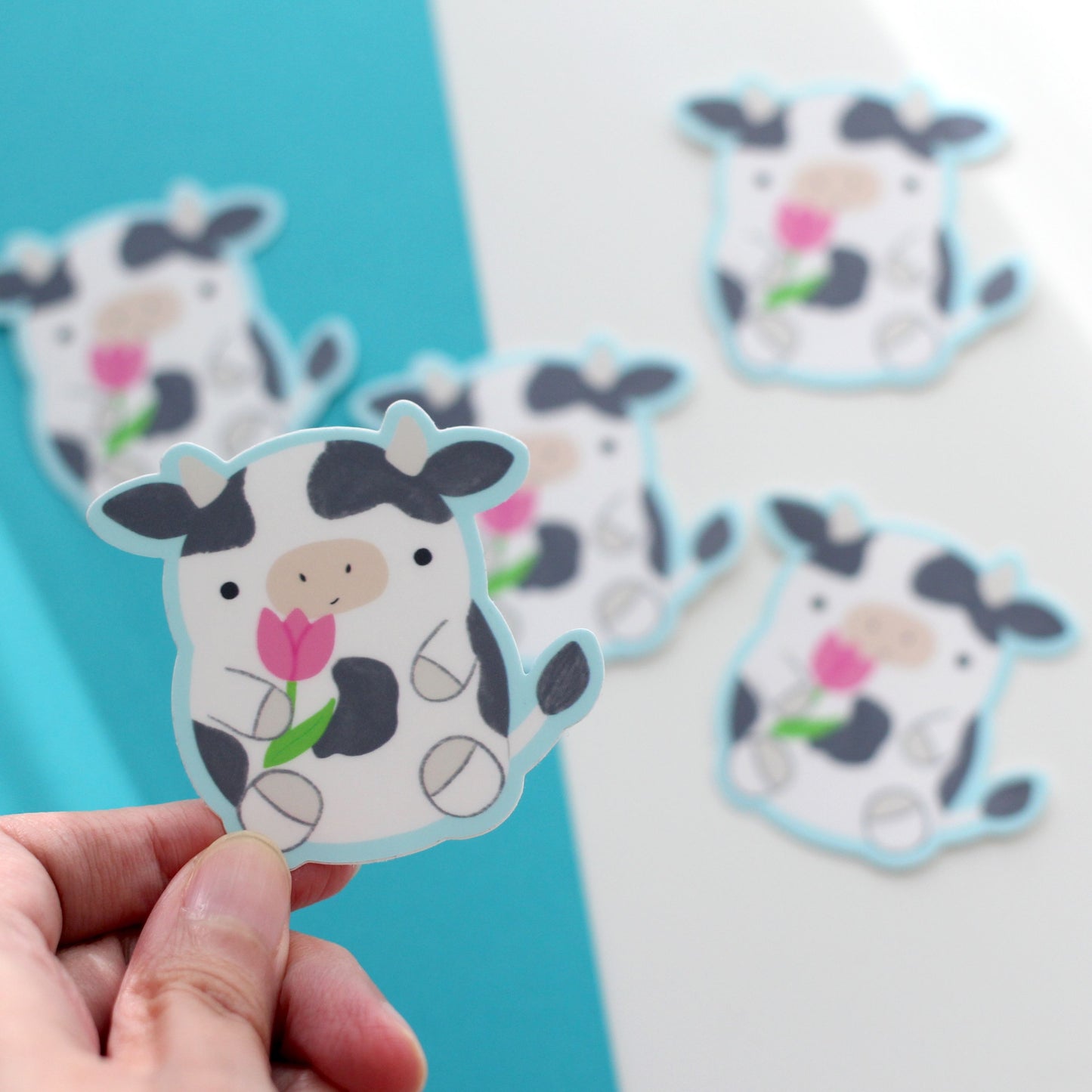 Cow Holding Tulip Vinyl Sticker