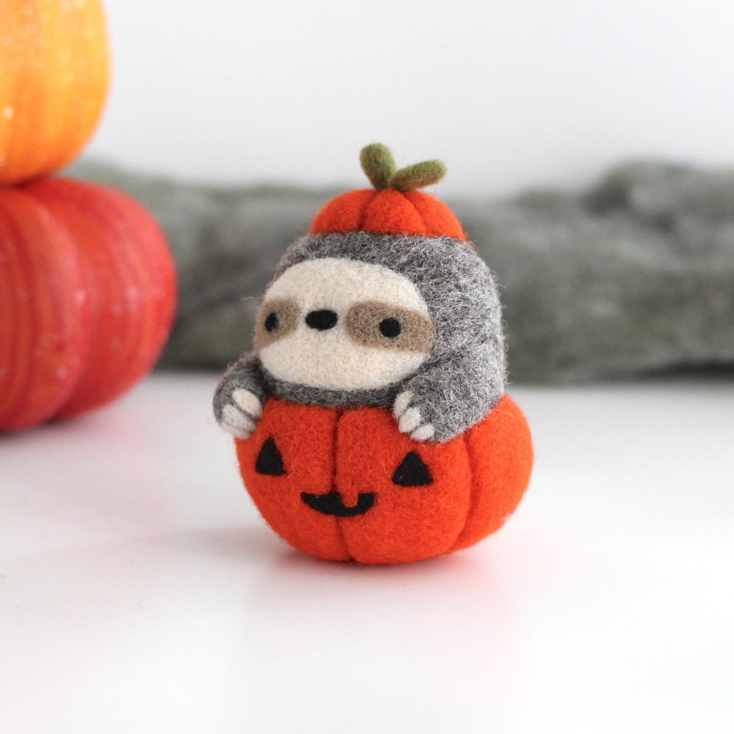 Needle Felted Sloth in Jack-o'-Lantern (Bright Orange)