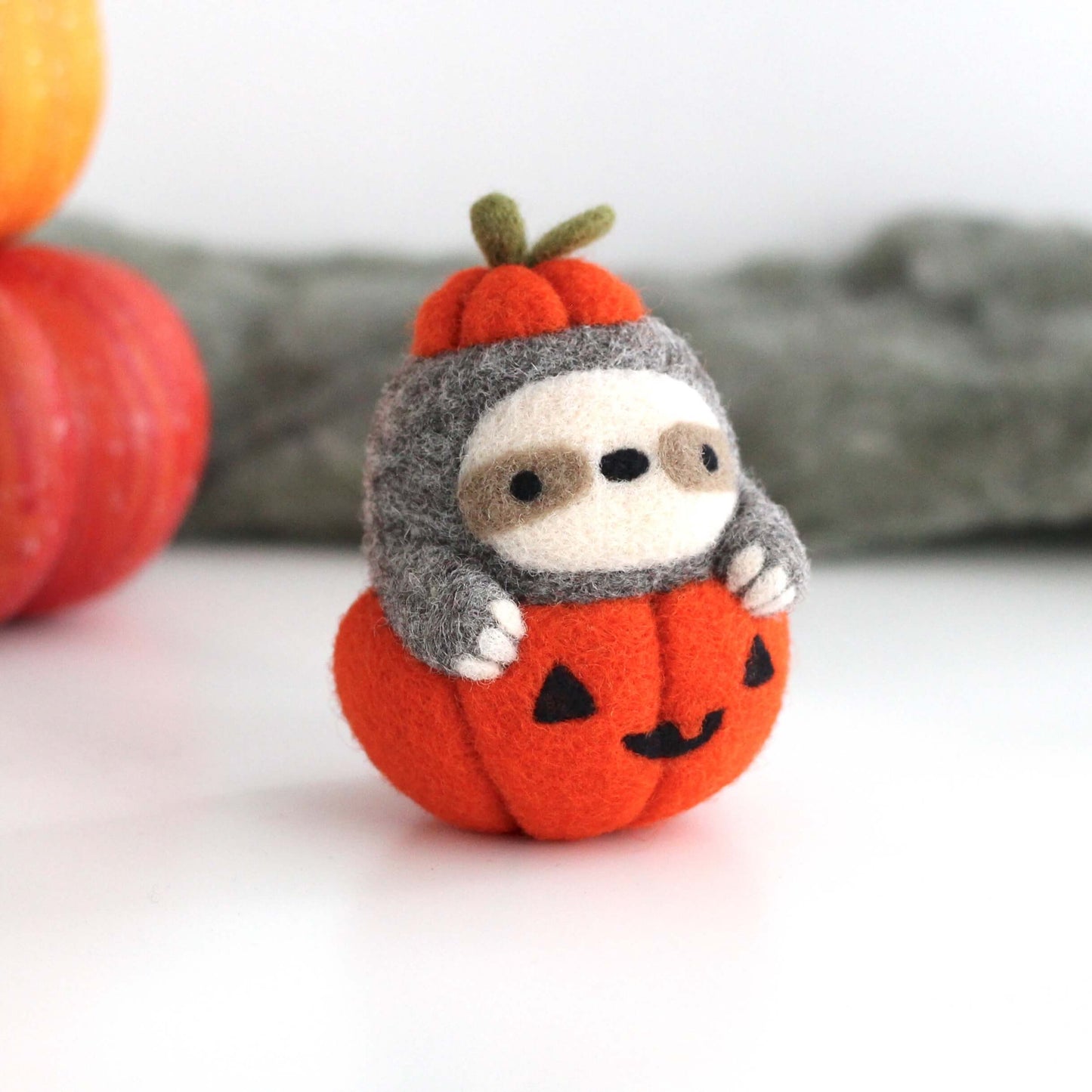 Needle Felted Sloth in Jack-o'-Lantern (Bright Orange)
