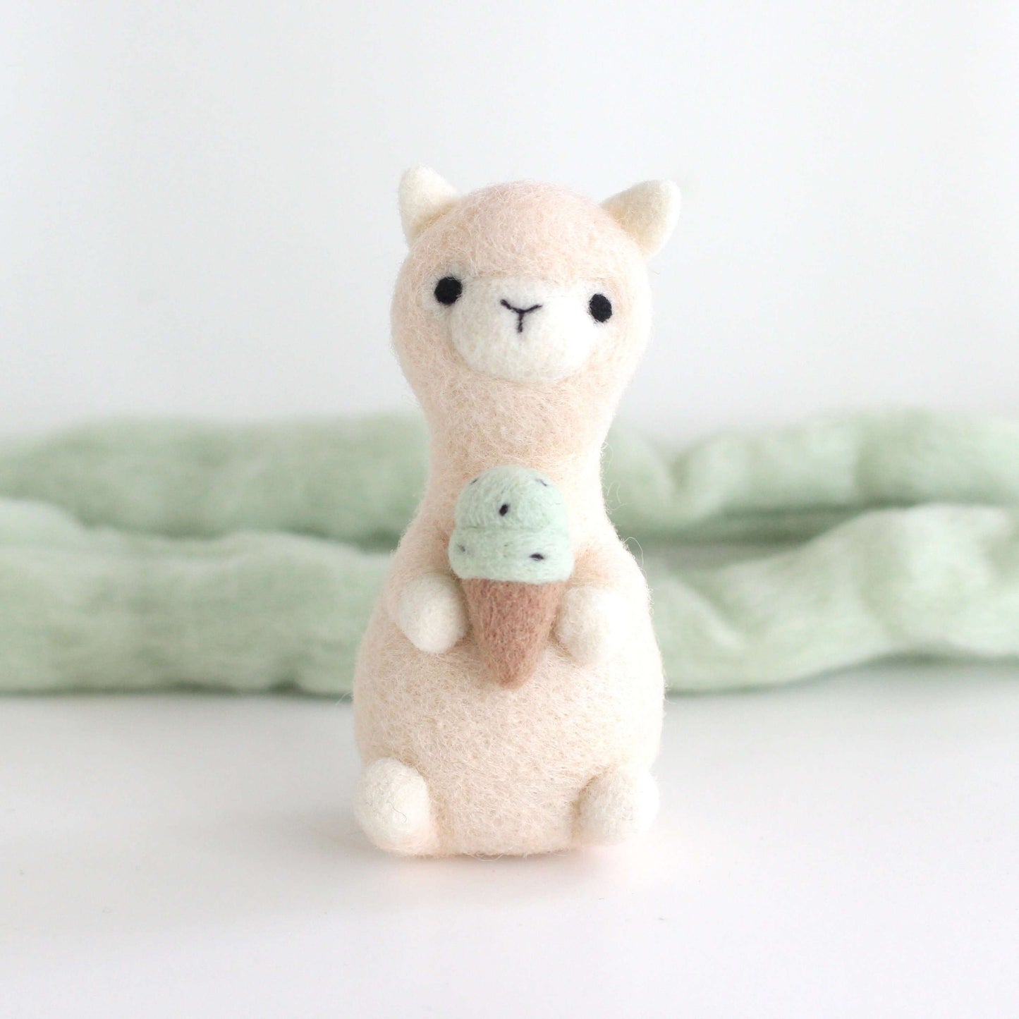 Needle Felted Alpaca holding Mint Chocolate Ice Cream