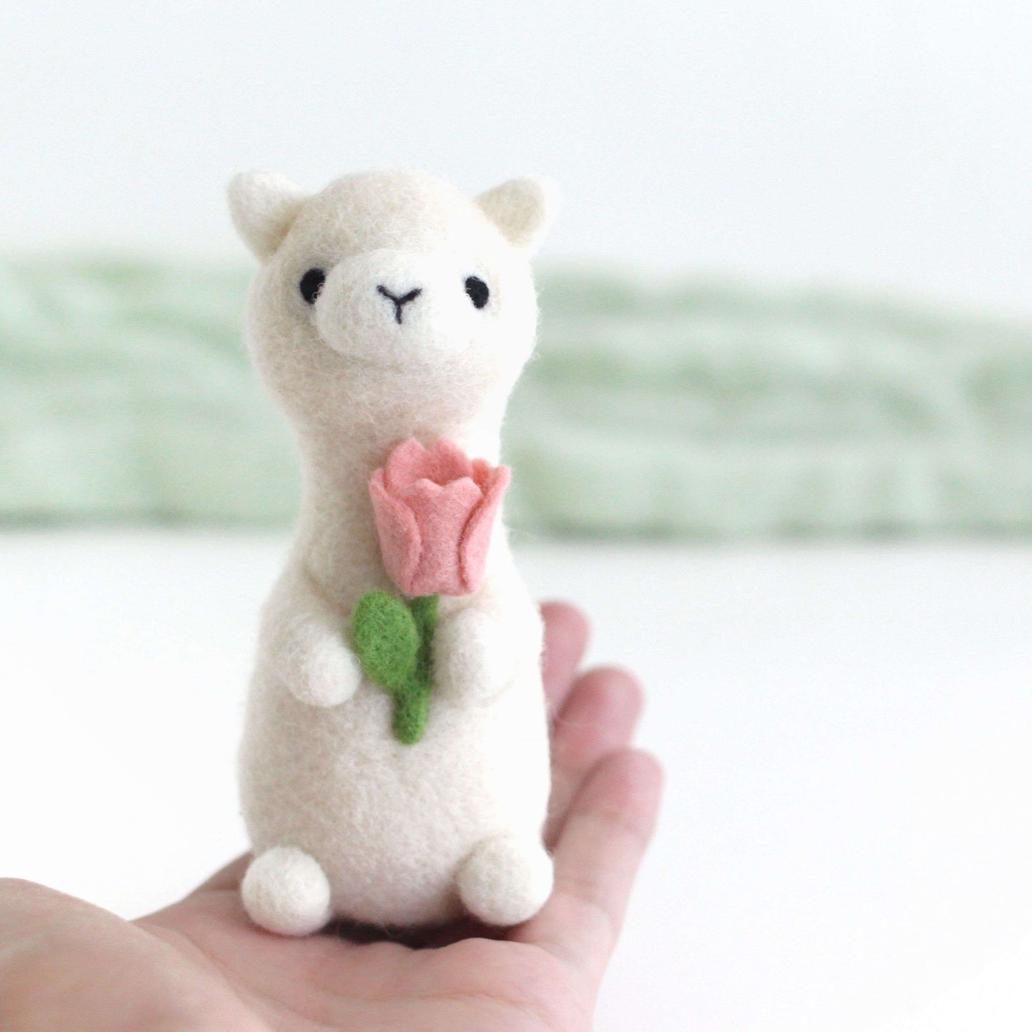 Needle Felted Alpaca holding Pink Tulip