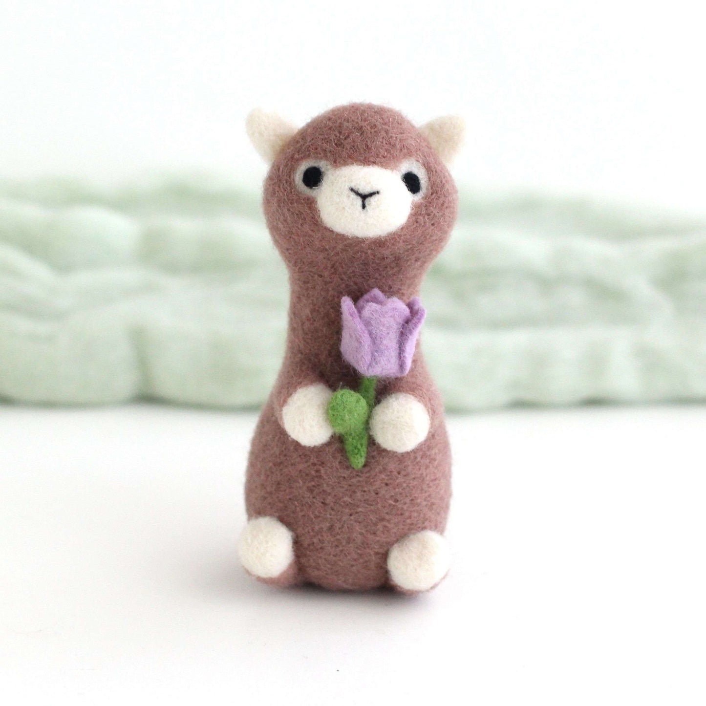 Needle Felted Alpaca holding Purple Tulip
