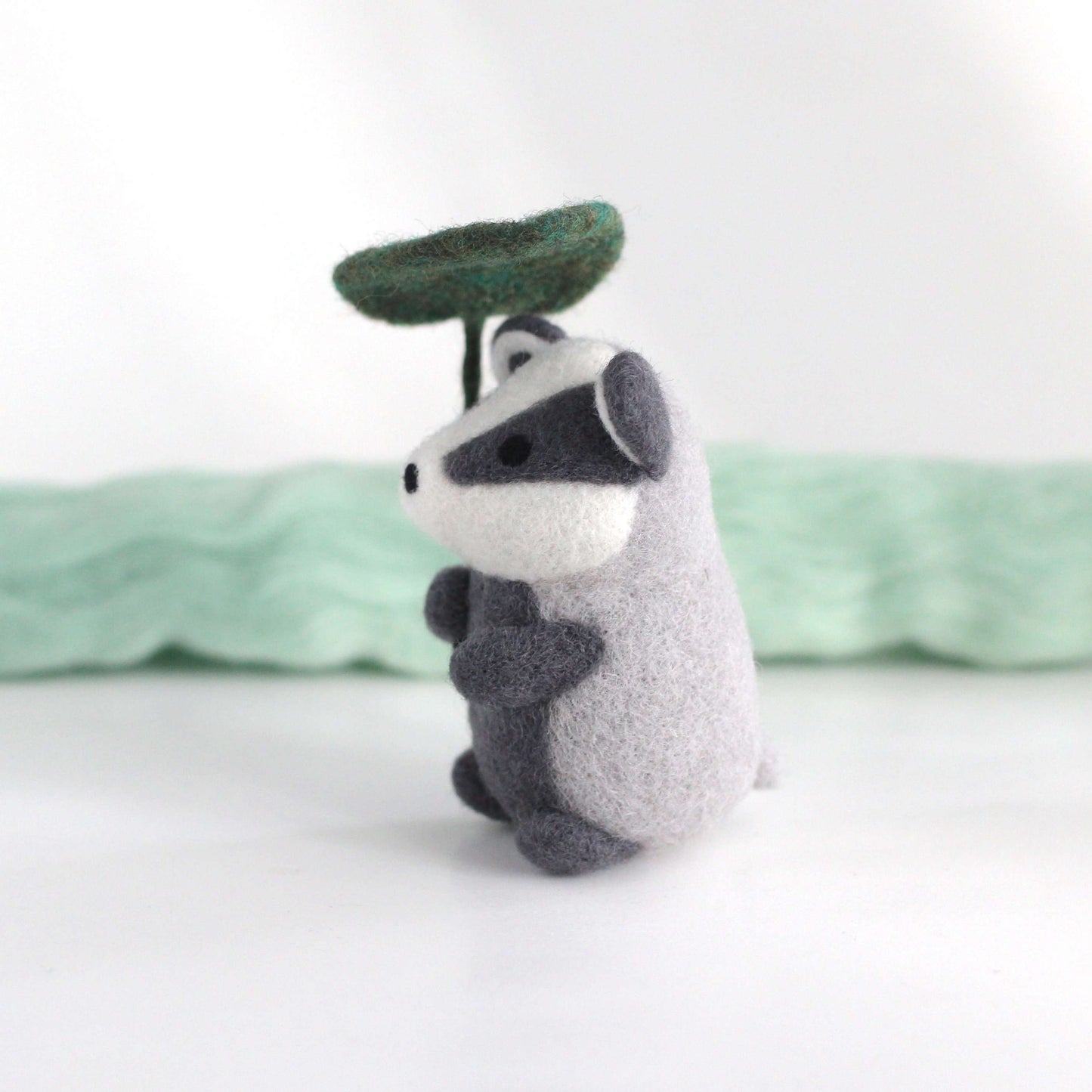 Needle Felted Badger Holding Leaf Umbrella