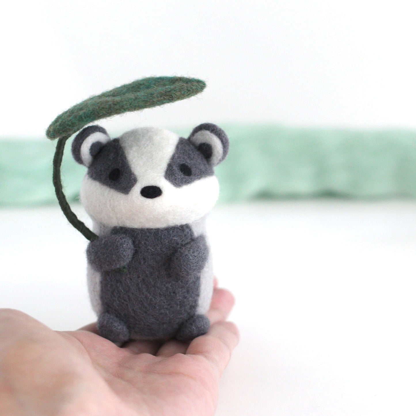 Needle Felted Badger Holding Leaf Umbrella