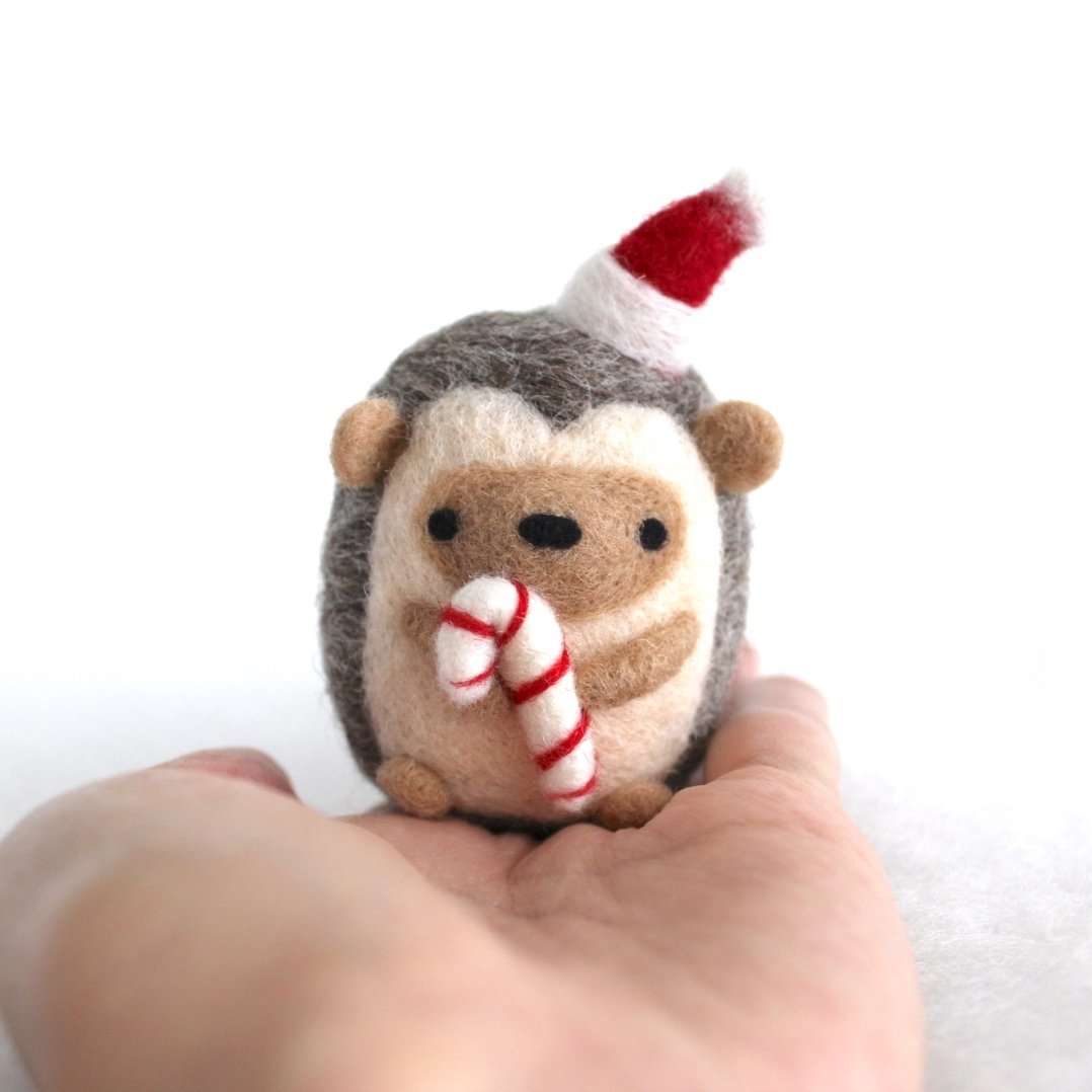 Needle Felted Hedgehog holding Candy Cane