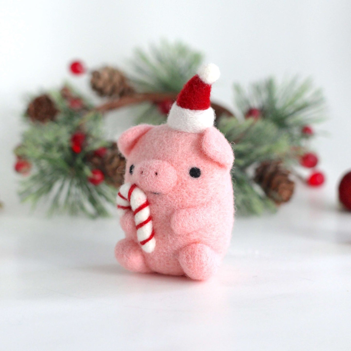 Needle Felted Pig holding Candy Cane