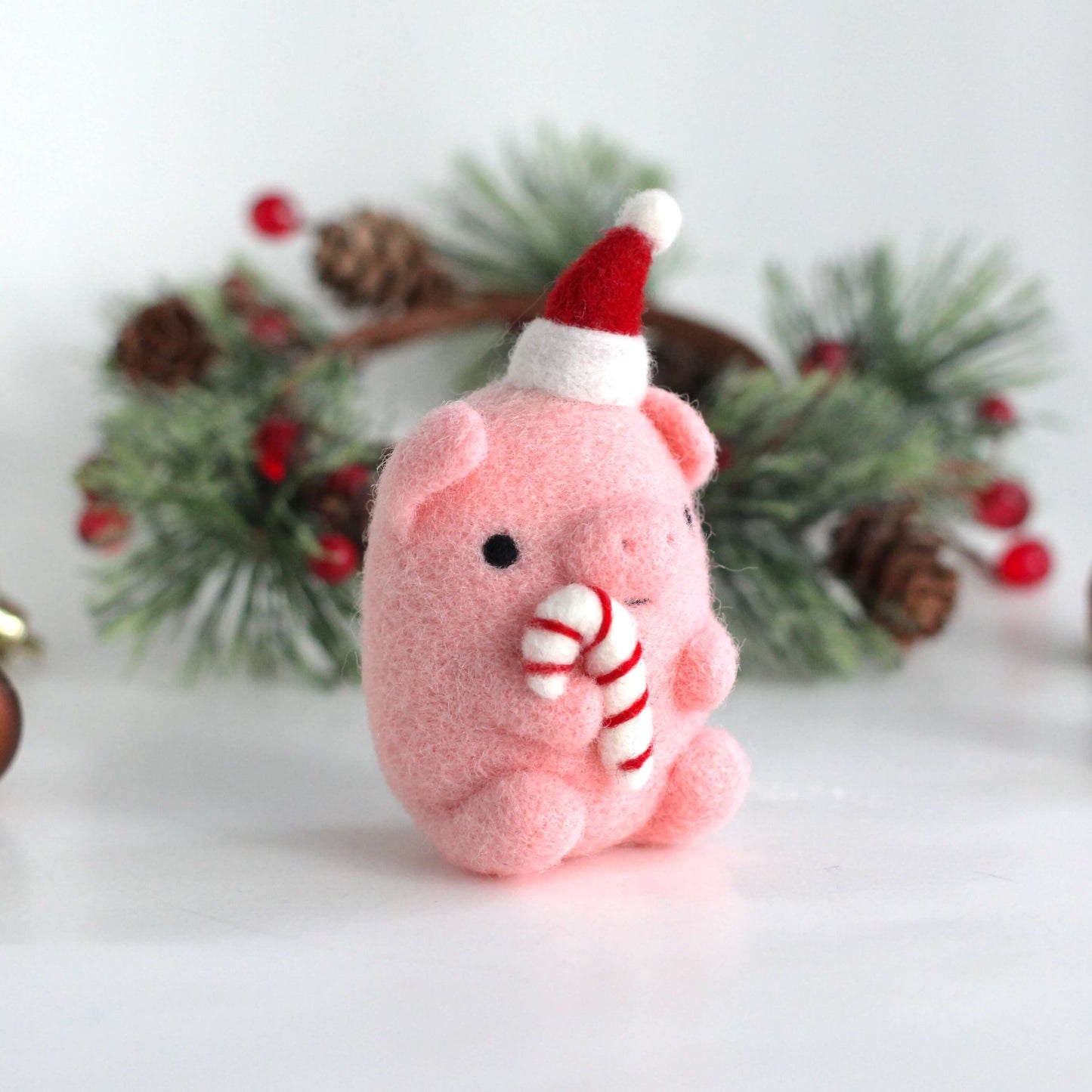 Needle Felted Pig holding Candy Cane