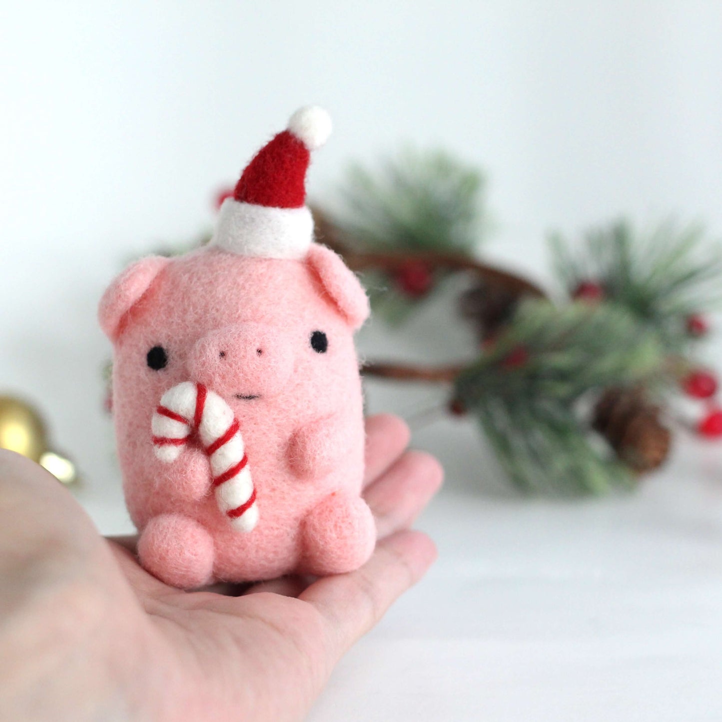 Needle Felted Pig holding Candy Cane