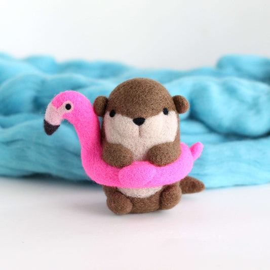 Needle Felted River Otter in a Flamingo Floatie