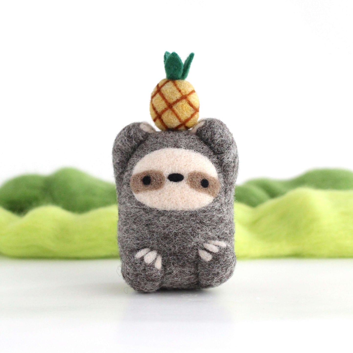 Needle Felted Sloth holding Pineapple
