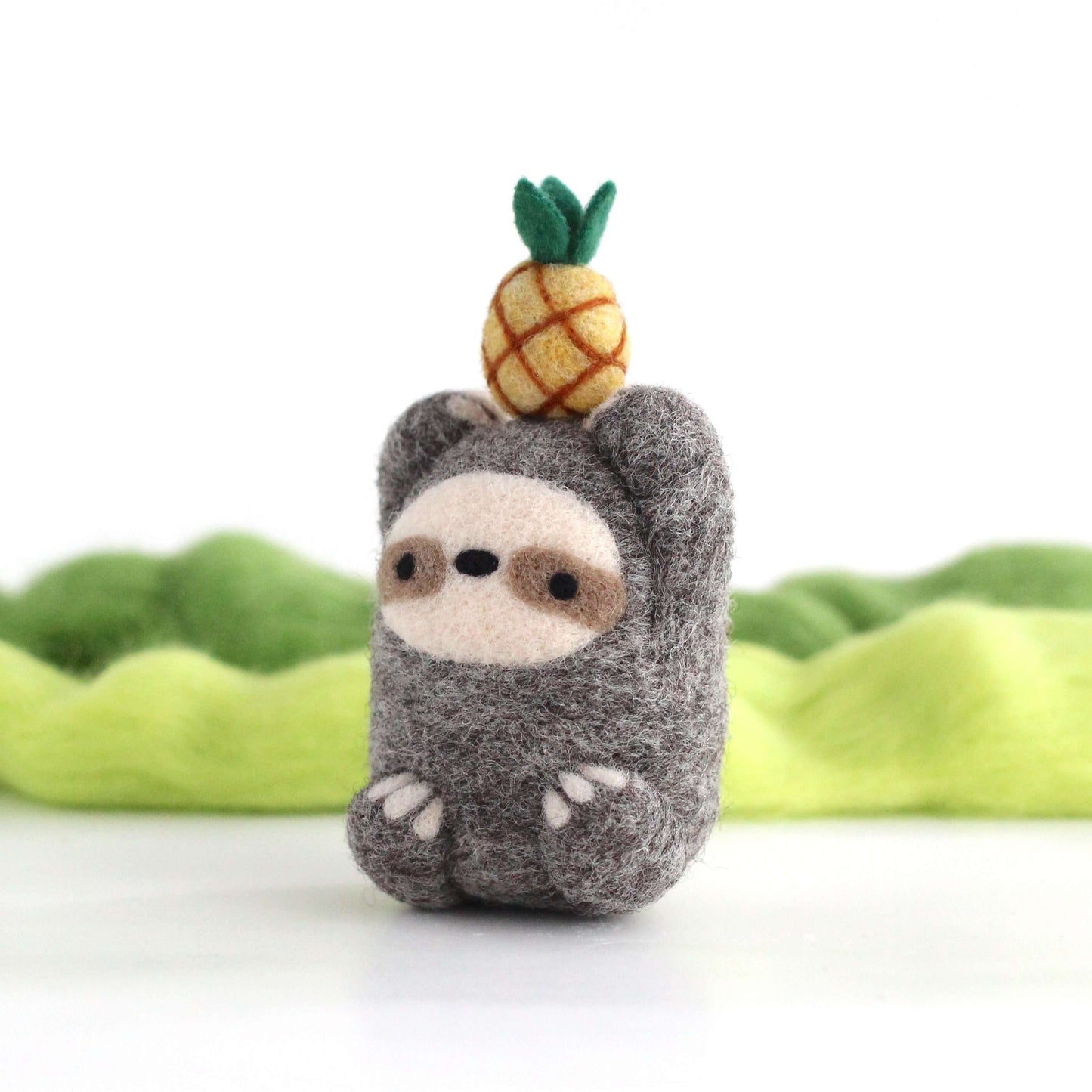 Needle Felted Sloth holding Pineapple