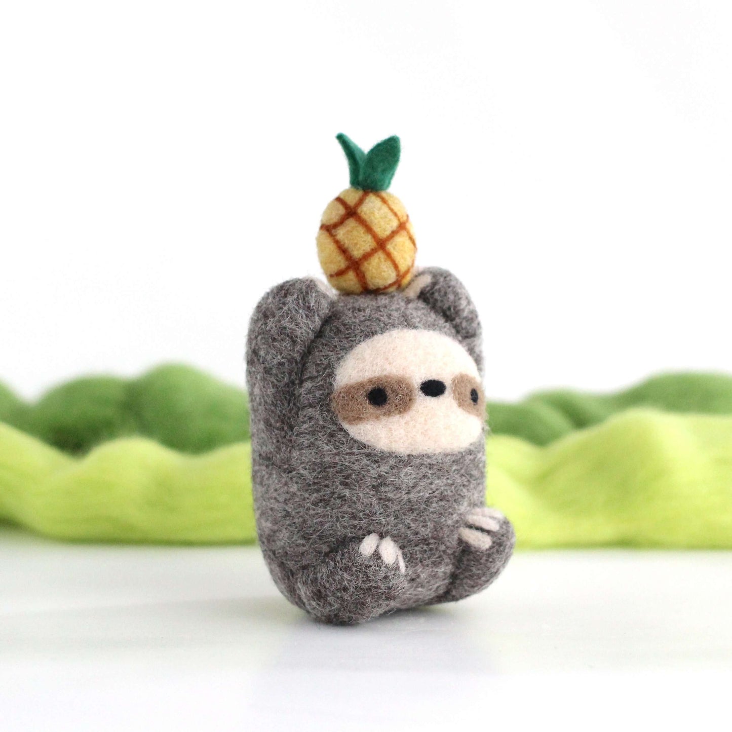 Needle Felted Sloth holding Pineapple