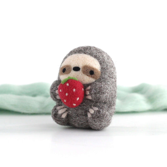 Needle Felted Sloth holding Strawberry