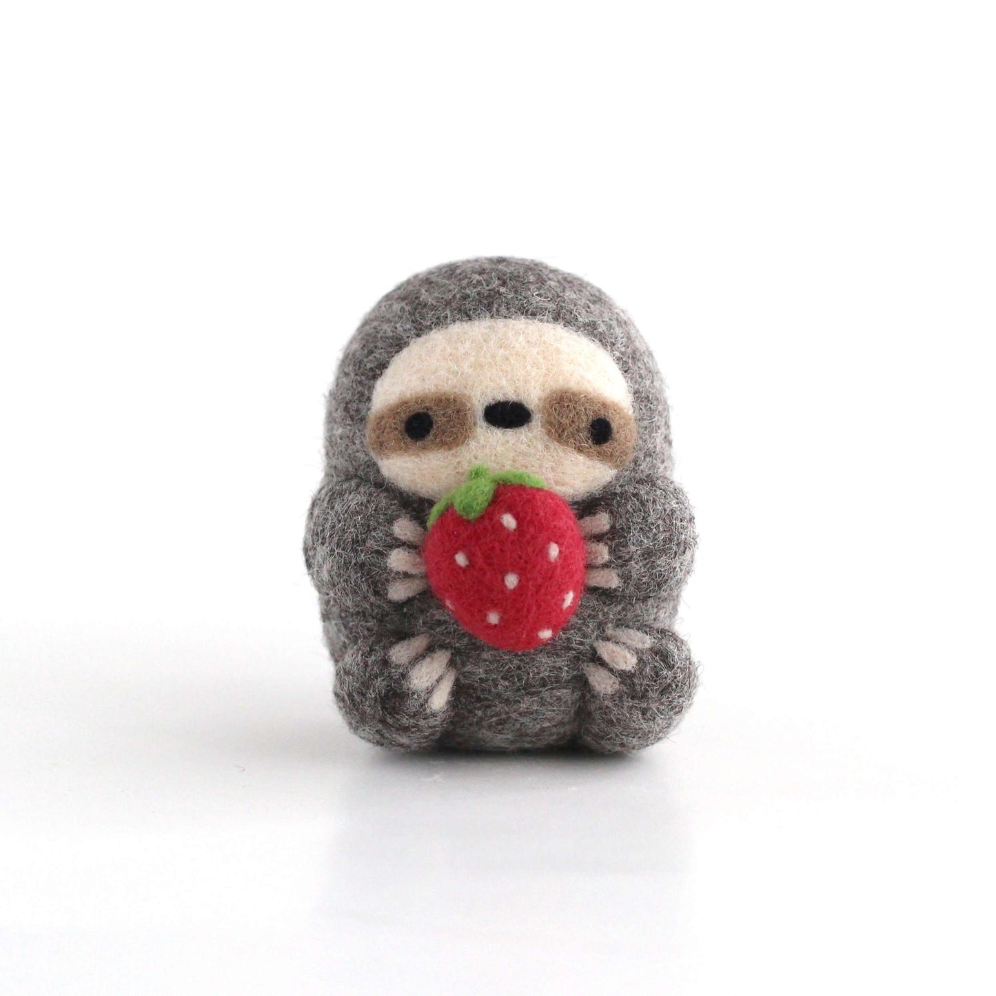 Needle Felted Sloth holding Strawberry