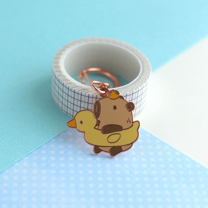 Capybara in Duck Floatie Enamel Keychain