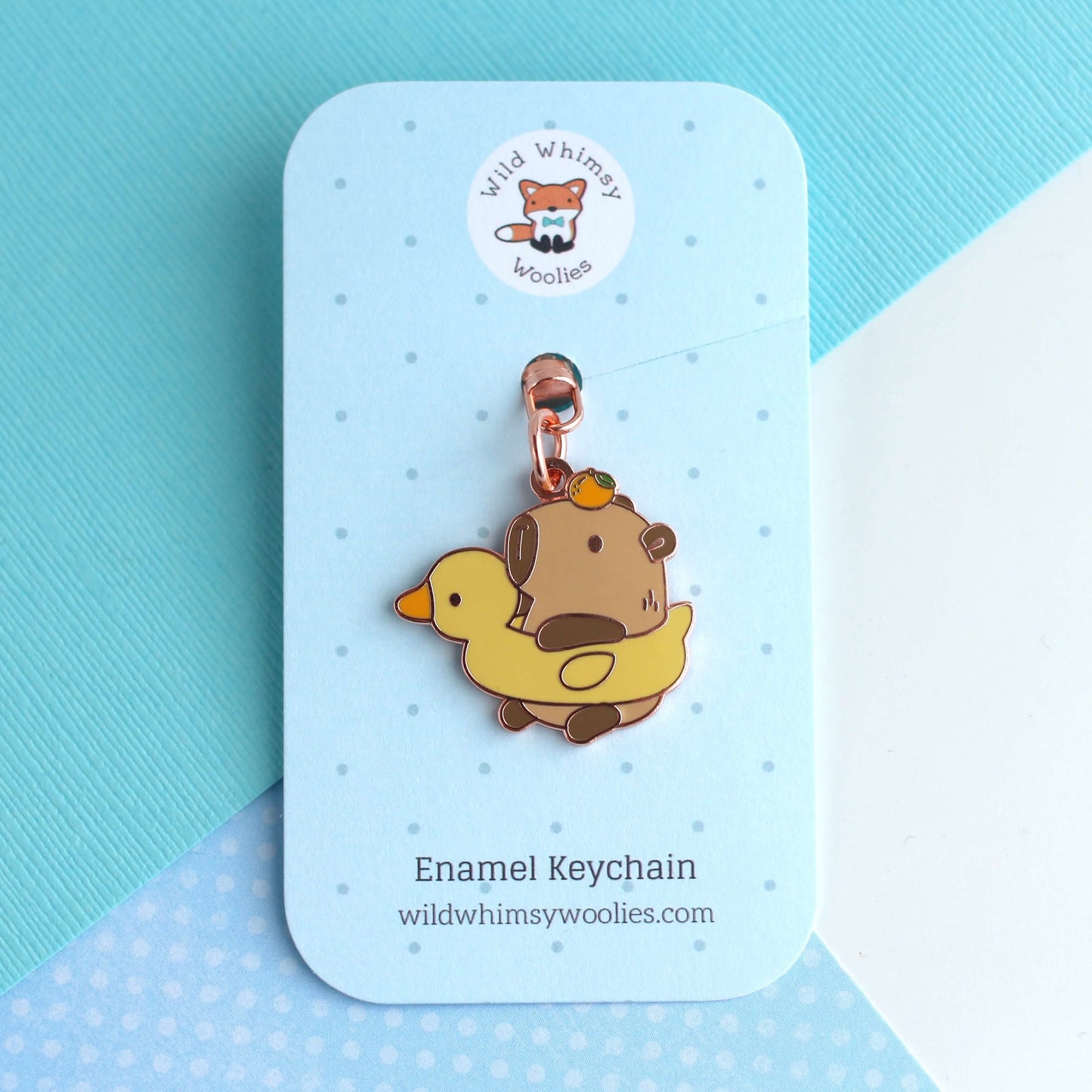 Capybara in Duck Floatie Enamel Keychain