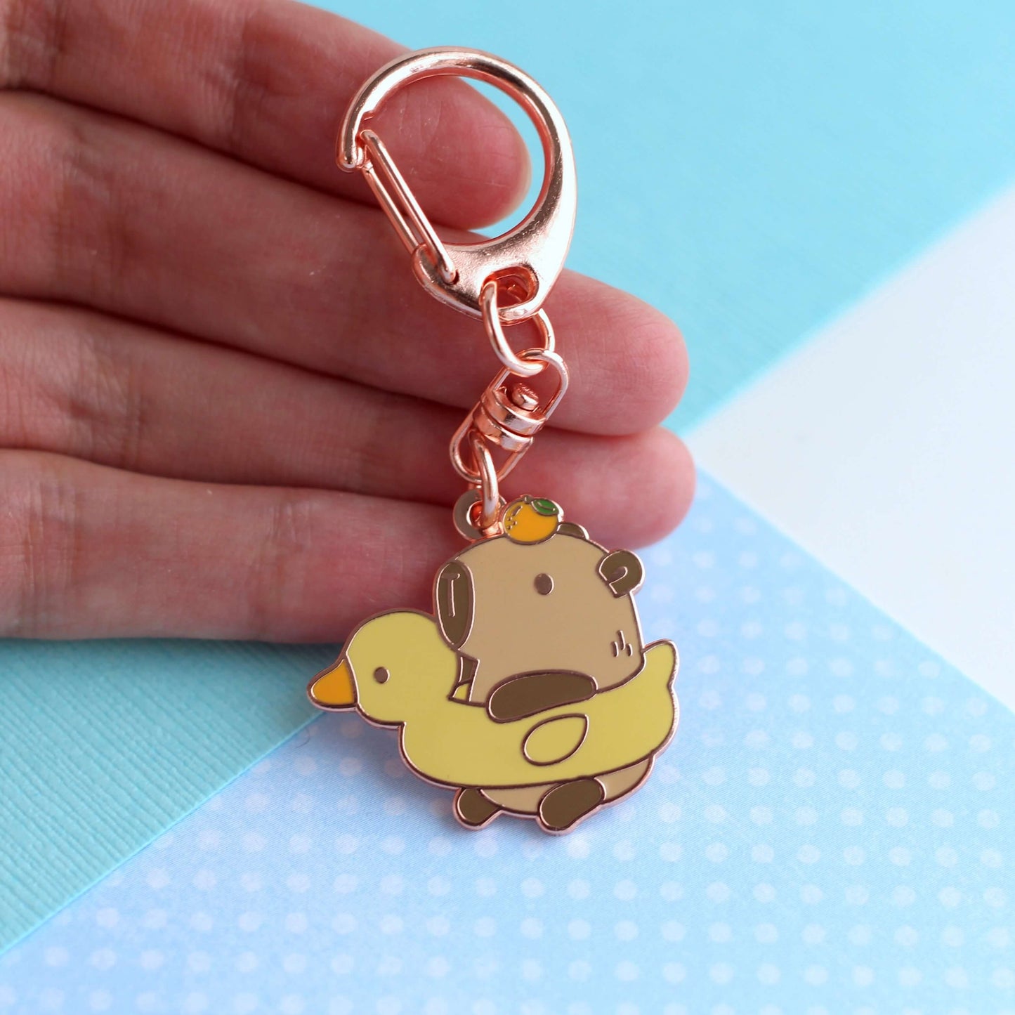 Capybara in Duck Floatie Enamel Keychain