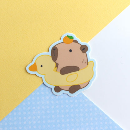 Capybara in Duck Floatie Vinyl Sticker
