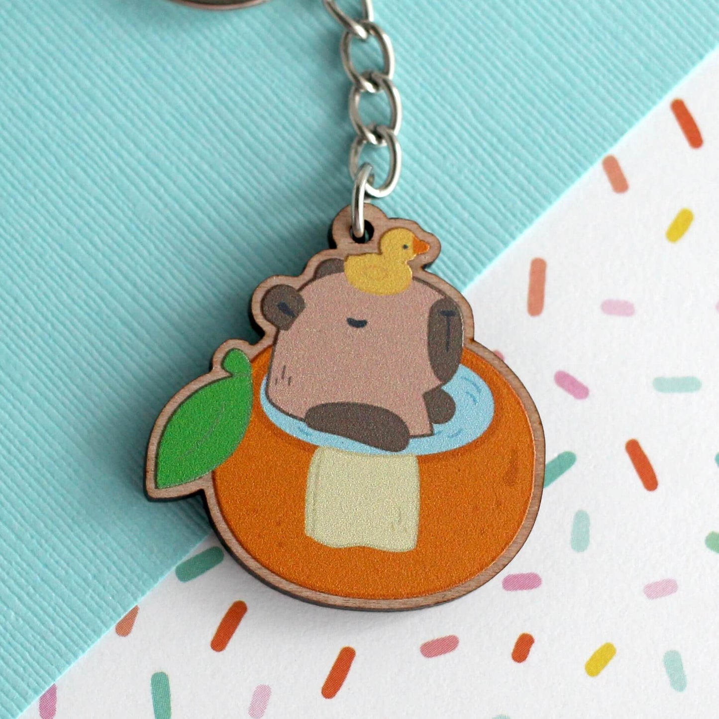 Capybara in an Orange Bath Wooden Keychain