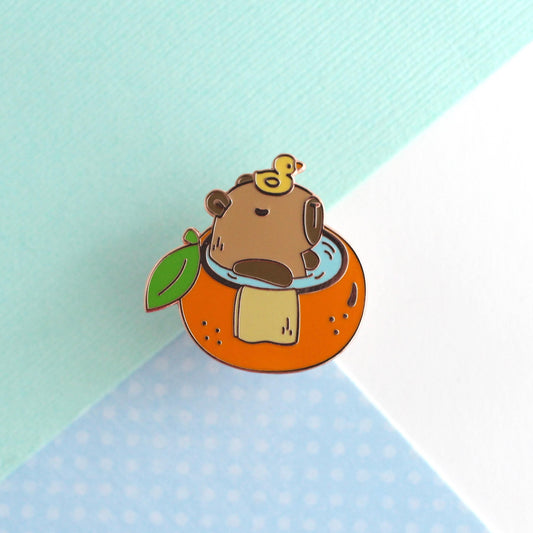 Capybara in Orange Bathtub Enamel Pin