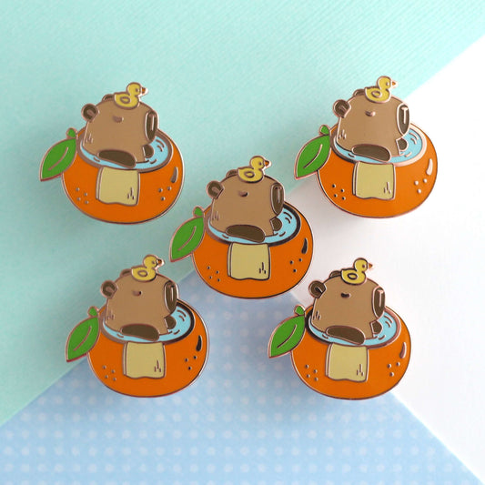 Capybara in Orange Bathtub Enamel Pin