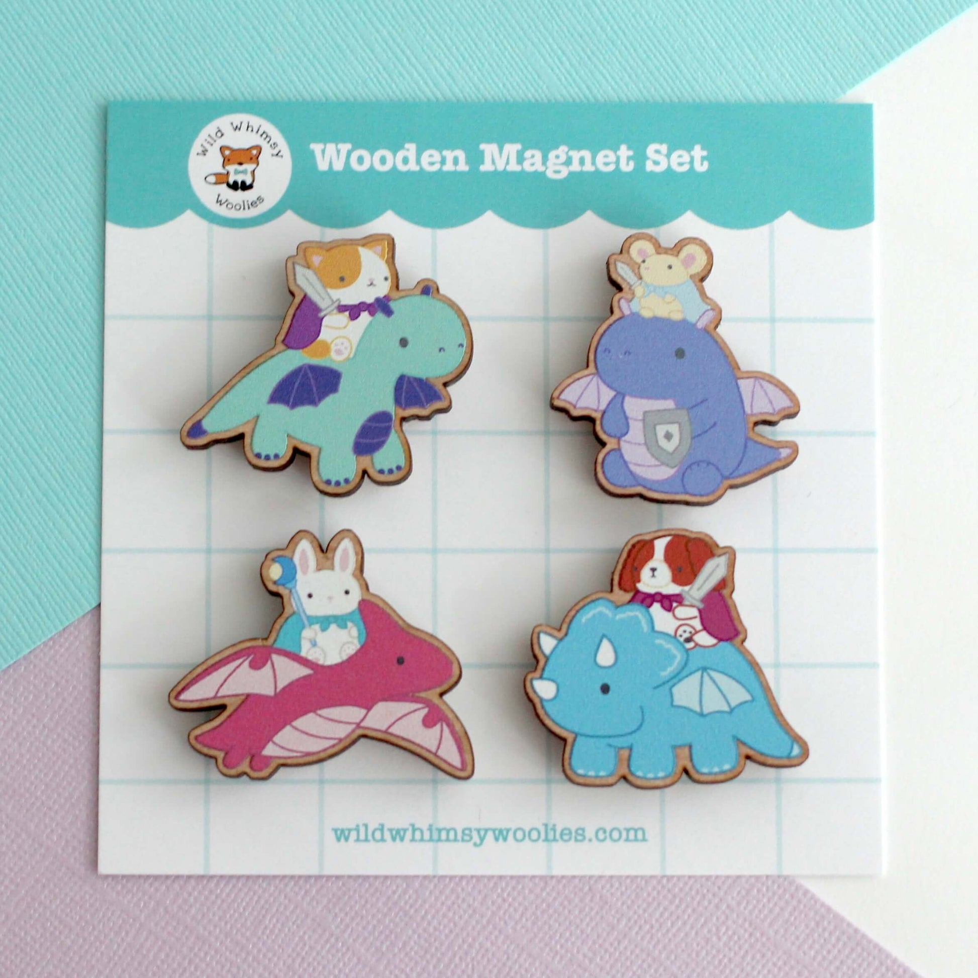 Set of dragon knight wooden magnet designs on a card with 'wildwhimsywoolies' branding.