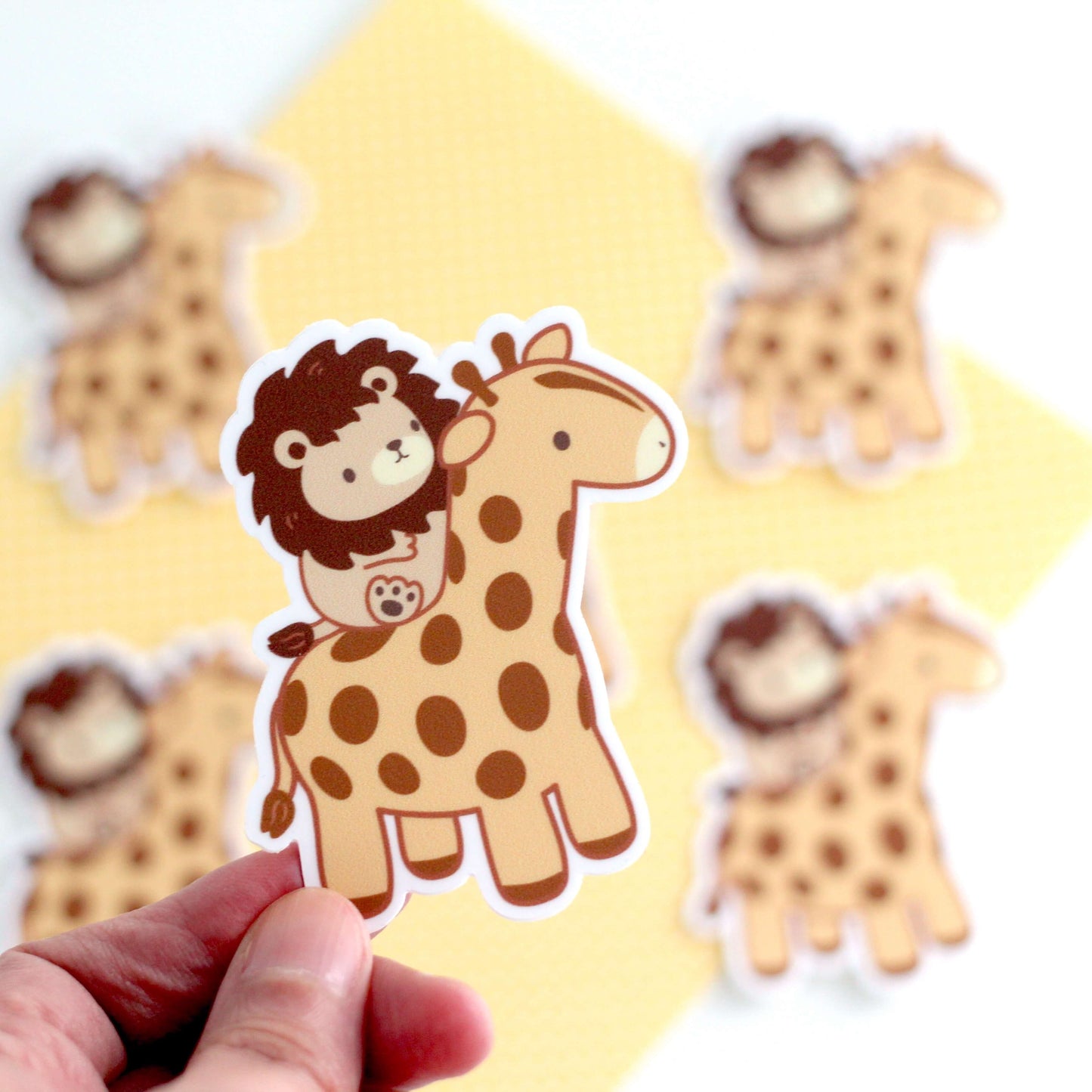 Lion riding a Giraffe Vinyl Sticker