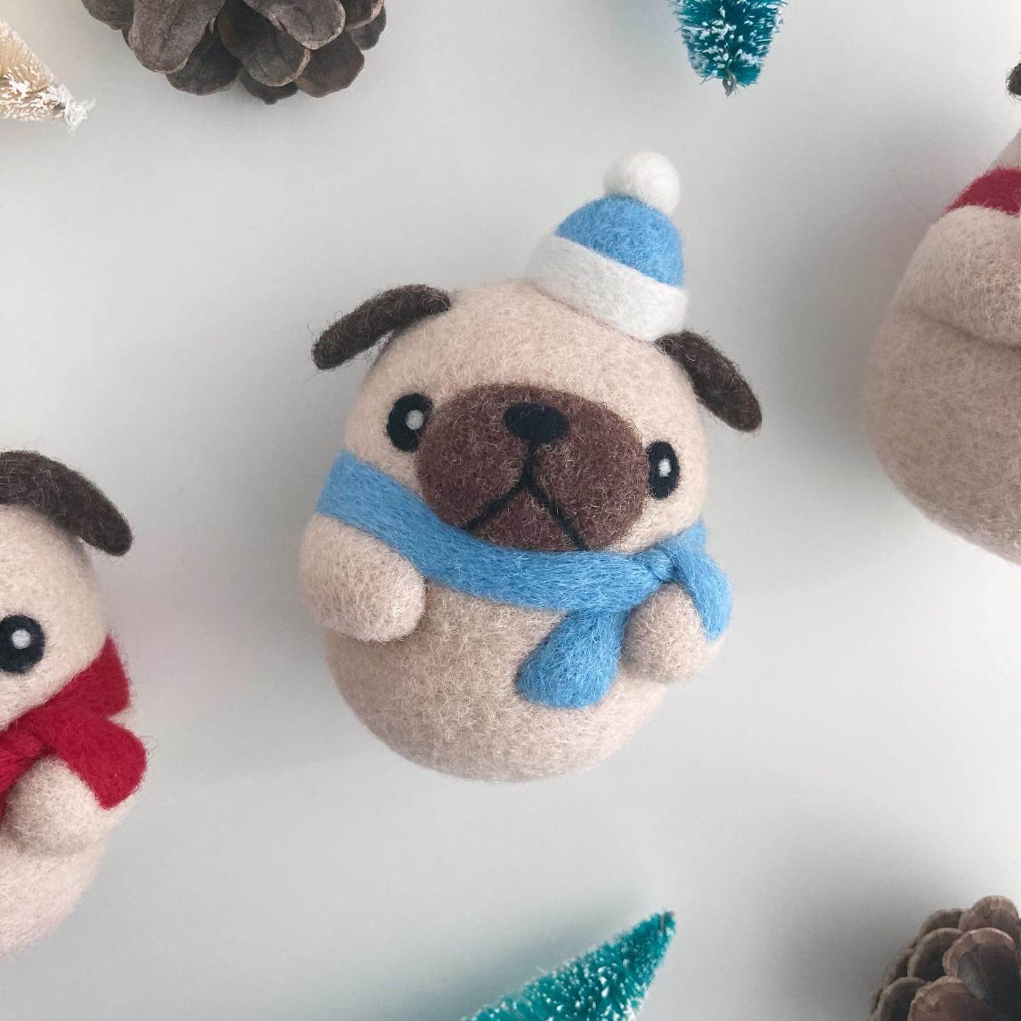 Needle Felted Pug with Blue Santa Hat