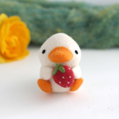 Needle Felted Duck holding a Strawberry