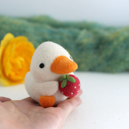 Needle Felted Duck holding a Strawberry