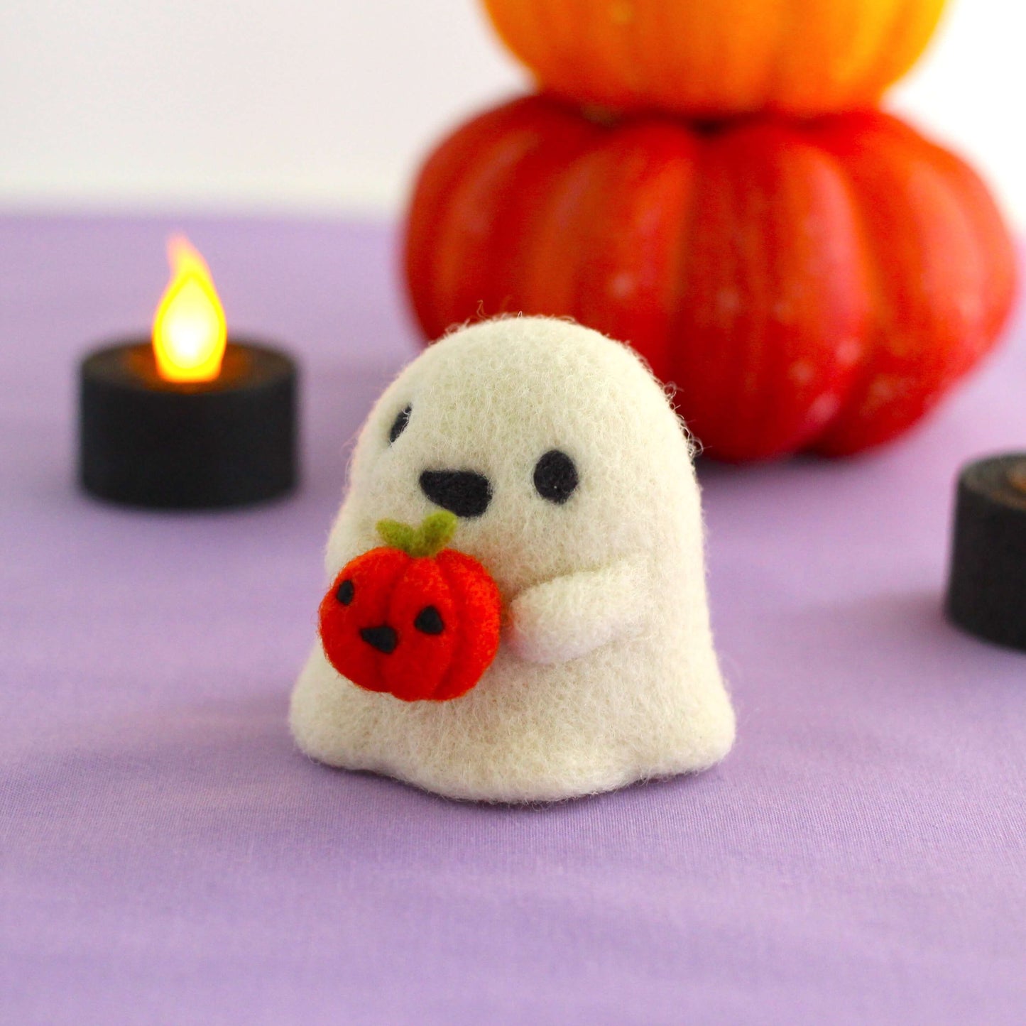 Needle Felted Ghostie holding Jack-o'-Lantern