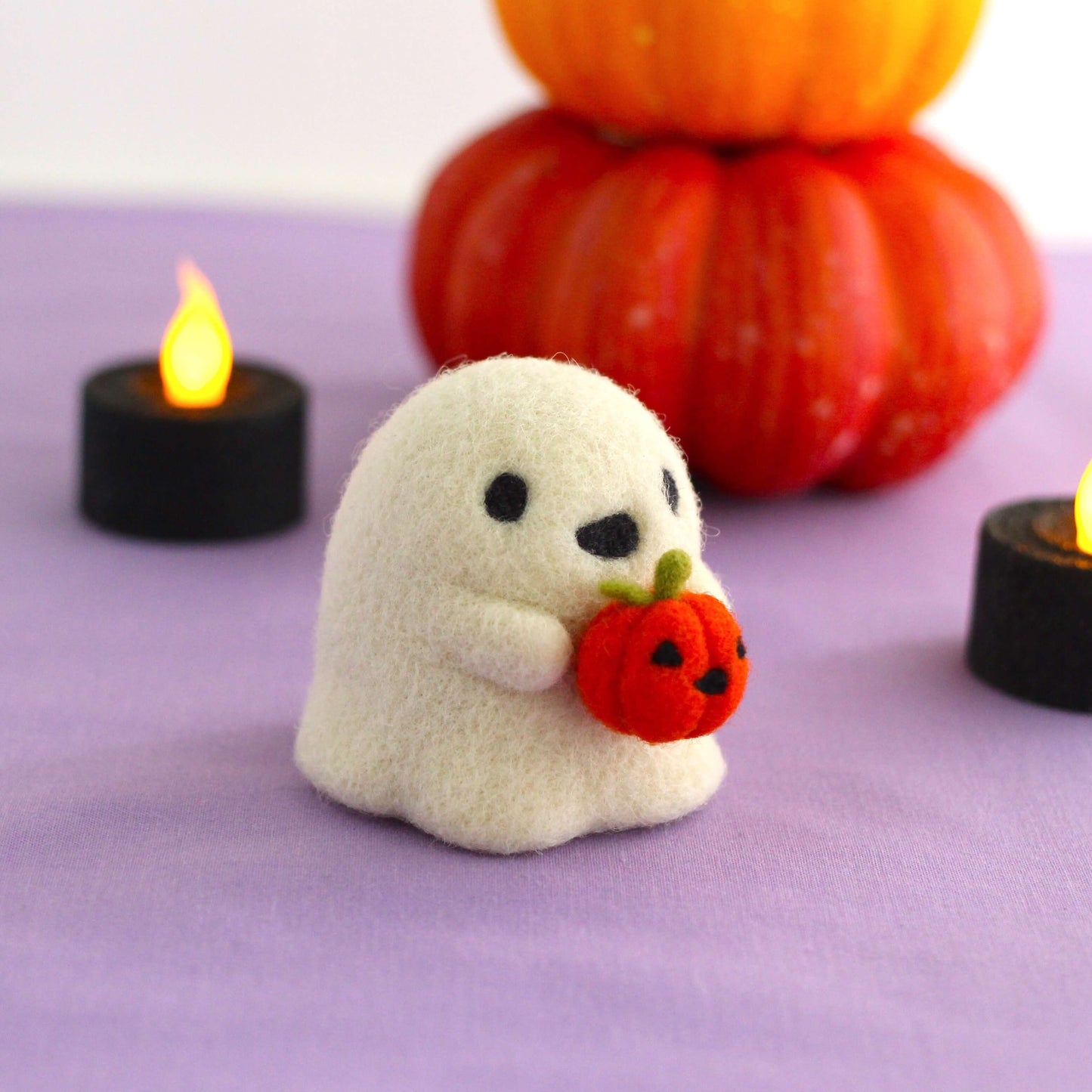 Needle Felted Ghostie holding Jack-o'-Lantern