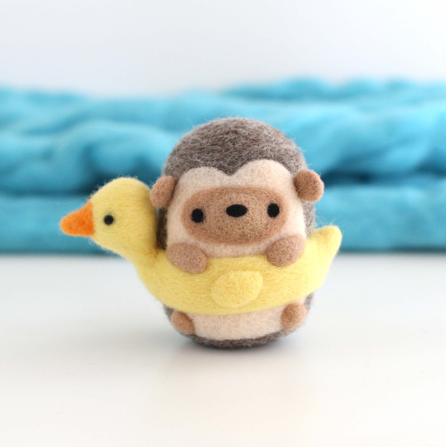 Needle Felted Hedgehog in a Duck Floatie